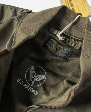 Olive jacket interior label with U.S. Air Force emblem