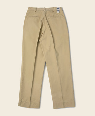 Khaki chino trousers on a flat lay, double pleats, straight relaxed fit