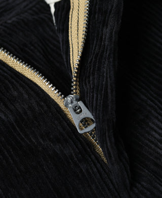 Corduroy trouser front fly with gold zipper and metal pull tab