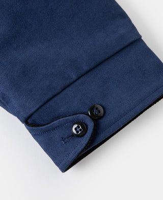 Blue moleskin cossack jacket sleeve cuff with two dark button closures