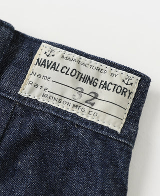 Indigo dungaree trousers with Naval Clothing Factory label on waistband