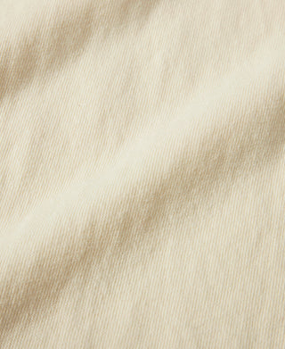Apricot cotton pocket T-shirt with ribbed crew neck and short sleeves