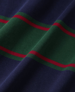Rugby shirt fabric close-up with navy base and green with red horizontal stripe pattern