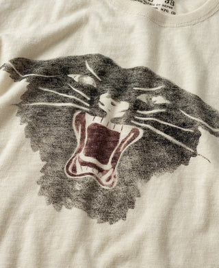 Cream T-shirt chest graphic: distressed black panther with red mouth and lines