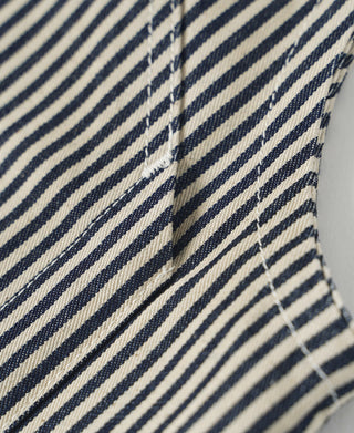Striped vest front with vertical button placket and dark buttons