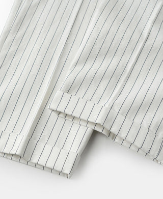 White pinstripe work pants cuff hem detail with stitched crease