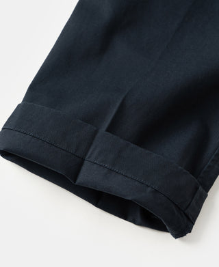 Navy cotton twill trousers with cuffed hem and reinforced stitching