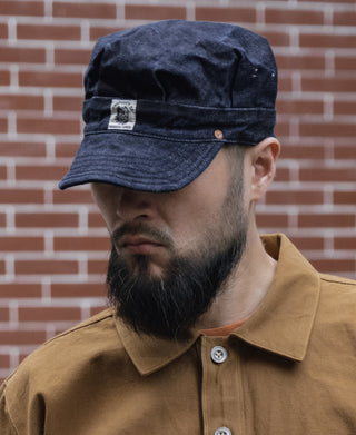 Indigo denim engineer cap with front patch and curved brim