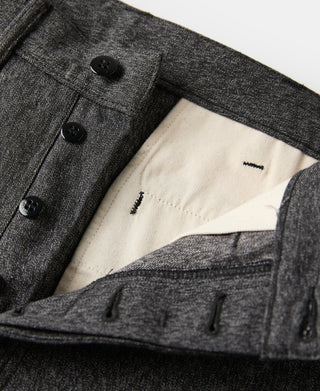Salt-and-pepper trousers interior waistband lining and back pocket opening