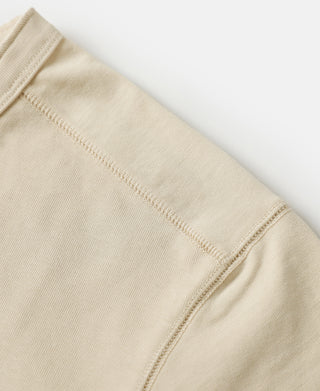 Apricot henley sleeve and side seam with topstitched finish