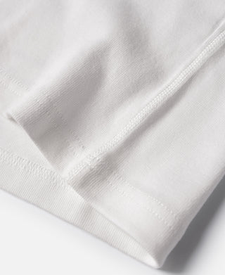 White cotton tank top bottom hem close-up