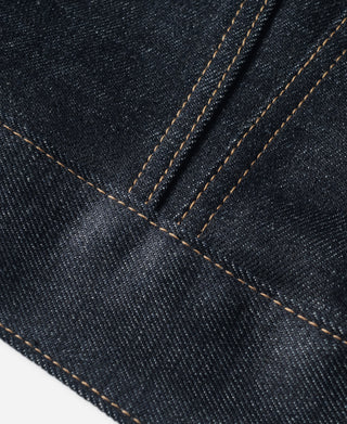 Indigo denim jacket with tan double-row decorative stitching