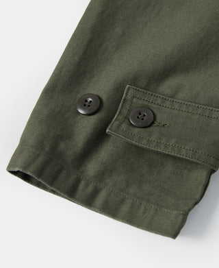 Olive fatigue utility shirt sleeve with two buttons and stitched cuff hem