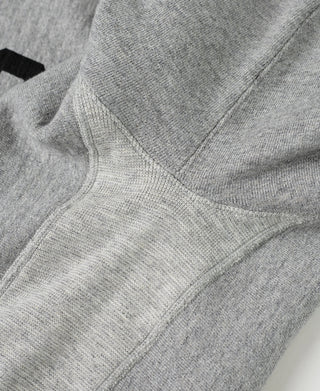 Heather gray sweatshirt neckline with contrasting topstitching and collar seam