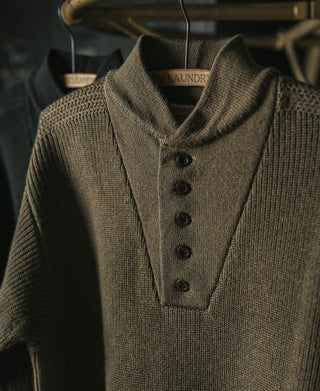 Olive high-neck wool sweater with buttoned placket and ribbed collar