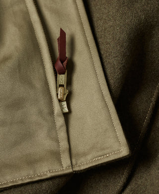 US Army yellow-green tanker jacket with front zipper and pull tab