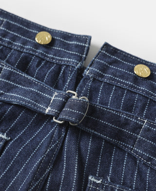 Indigo pinstripe pants close-up showing belt loops and front snap detailing