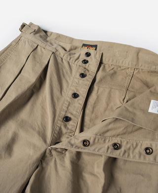 Khaki combat pants front with button placket and pleated waistband