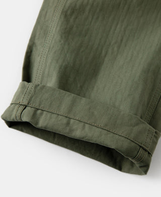 Olive cotton fatigue trousers, cuff with stitched hem and seam detailing