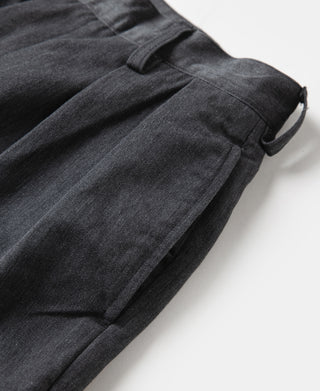 Dark gray pleated chino trousers with stitched side seam and cropped hem cuff