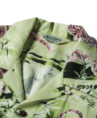 Light green aloha shirt interior with collar and label, tiger and bamboo print