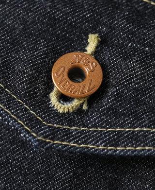 Indigo denim jacket pocket button with brand medallion and yellow thread trim