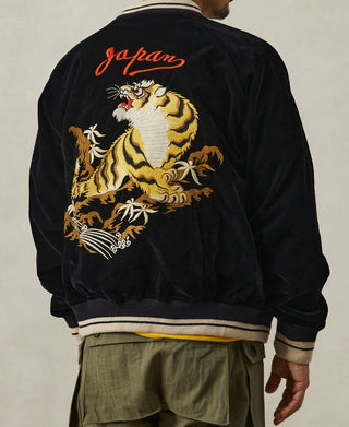 Reversible jacket back view: black fabric with red “japan” text and tiger embroidery