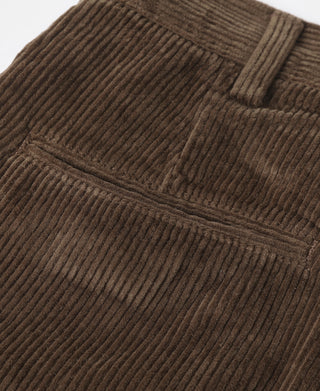 Brown corduroy trousers waistband with vertical wale pattern and pleats
