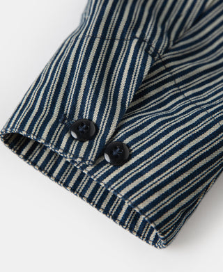 Striped cossack jacket cuff with two black buttons, blue-and-cream vertical stripes