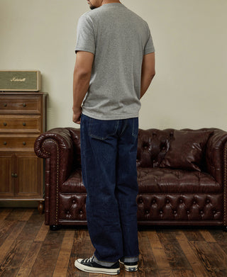 Gray crewneck athletic T-shirt, back view with short sleeves and dark jeans