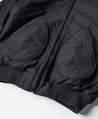 Black jacket hem with two flap chest pockets and front zipper seam