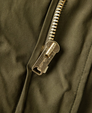 Olive parka zipper with metal pull and protective placket detail