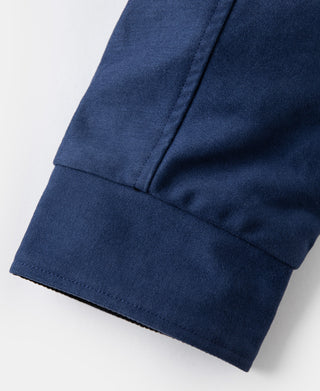 Blue moleskin cossack jacket hem with smooth seam finish