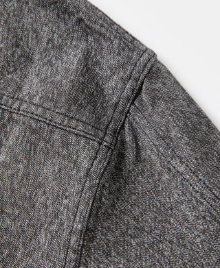 Salt-and-pepper cossack jacket sleeve and shoulder seam detail, dark topstitching