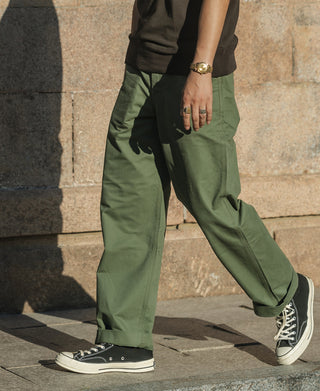 Olive wide-leg officer trousers with belt loops, front pockets, and straight-leg fit
