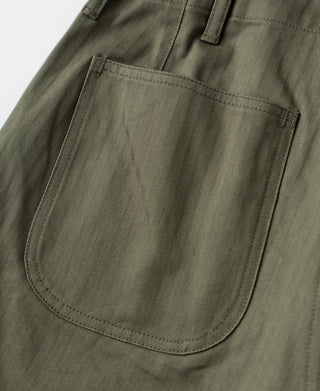 Olive trousers with large front patch pocket and belt loop