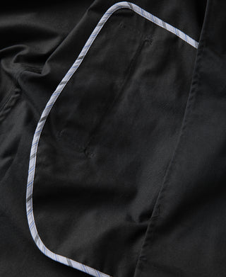 Black all-weather trench coat, hood edge with contrast striped trim