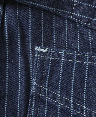 Indigo pinstripe pants pocket detail with stitched contrast trim