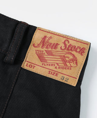 Inner label on black breeches reading "NAN STORE" and size 32