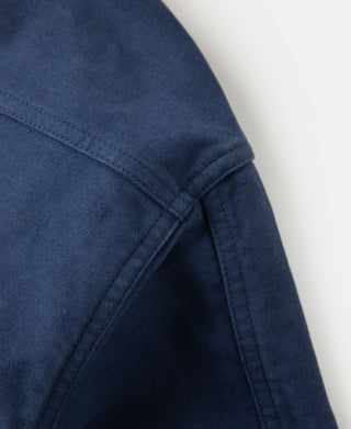 Blue moleskin cossack jacket sleeve with stitched seam and cuff detail