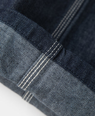 Indigo denim painter pants, stitched seam and dark cuff detail