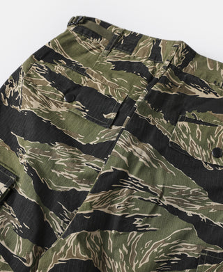 Tiger stripe camo fatigue pants front view with cargo pocket flap and metal button.