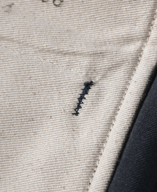Navy officer trousers zipper fly edge with reinforced stitching detail