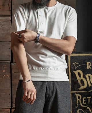 White short-sleeve henley T-shirt with buttoned neckline placket