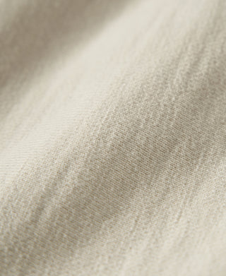Apricot terry cloth fabric texture on sweatpants