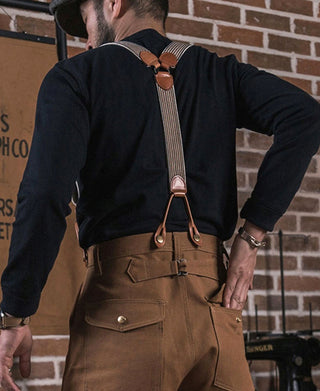 Black long-sleeve henley shirt with three-button placket and ribbed collar