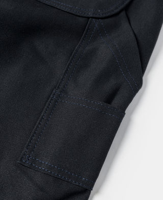 Navy canvas leg pocket with bartack reinforcement and edge stitching