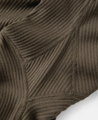 Henley button placket stitching on olive-brown ribbed long sleeve