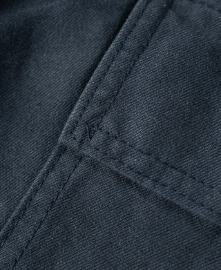 Navy utility shorts fabric with stitched seam detail