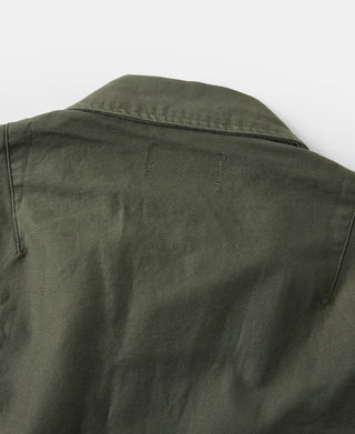Olive fatigue utility shirt, back yoke and top seam detail